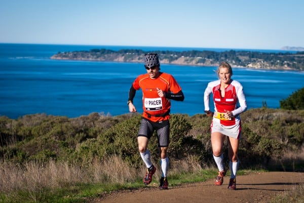 Anna Frost with her pacer in a beautiful setting. Photo: Brett Rivers Anna Frost 2011 TNF 100