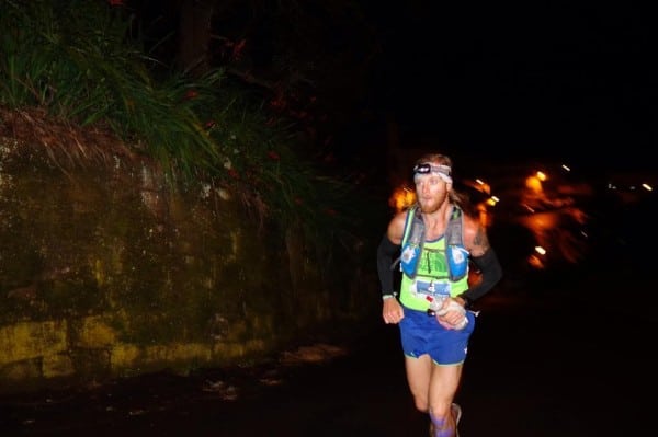 Timothy Olson climbs into the night. Photo: iRunFar/Bryon Powell