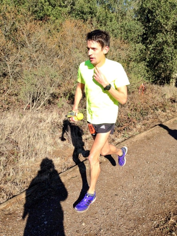 Chris Vargo running his way to third place at mile 44. Photo: iRunFar/Meghan Hicks